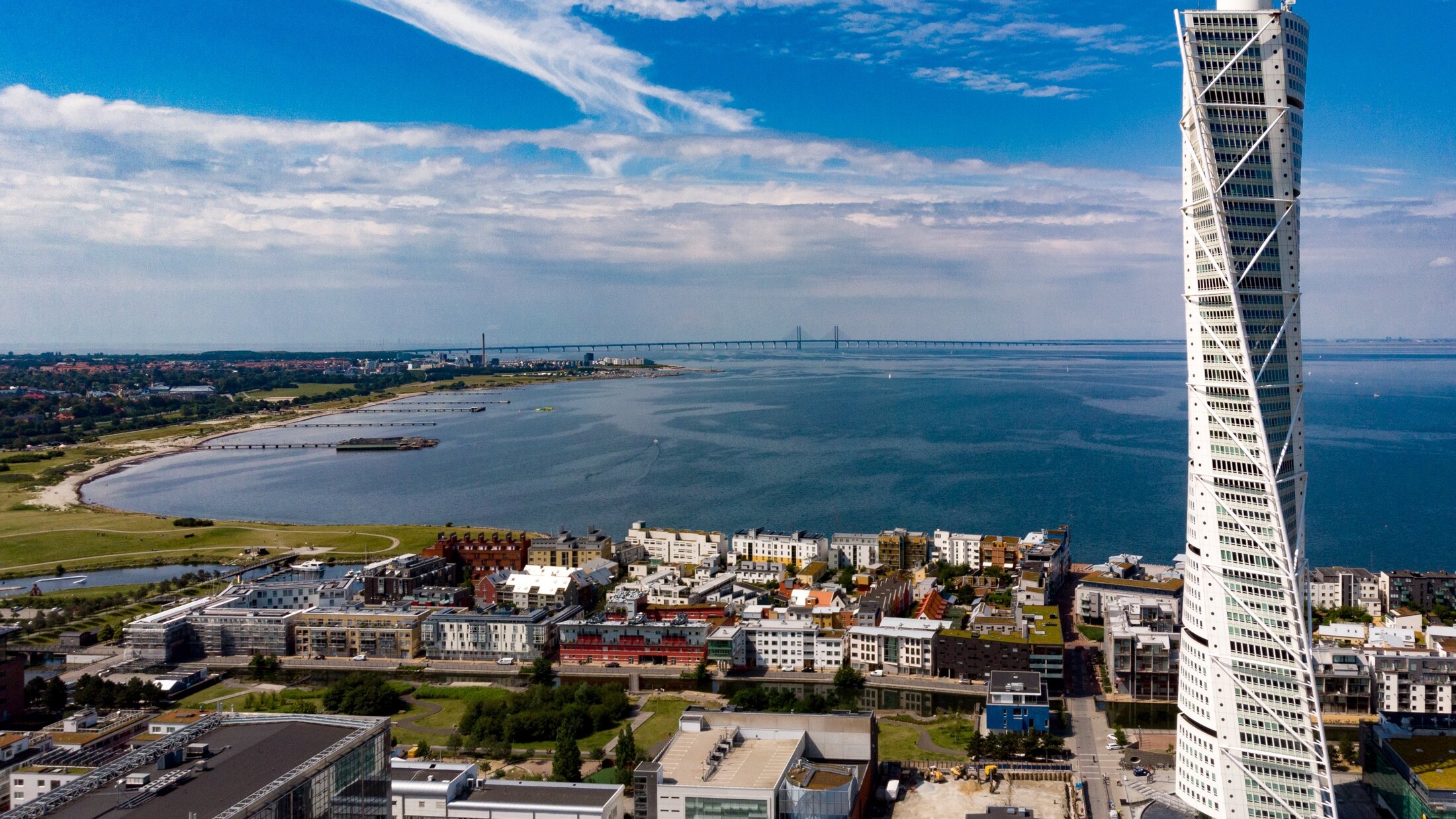 Aerial view of Malmo waterfront, Turning Torso, and Oresund Bridge